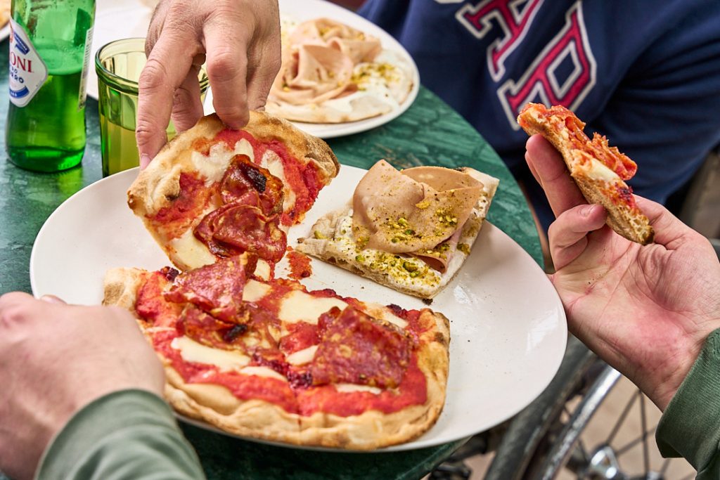 Sharing Pizza at Table